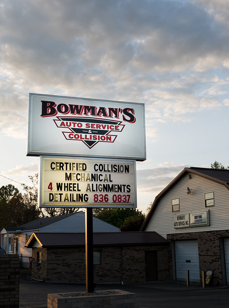 Bowman's Sign in front of shop